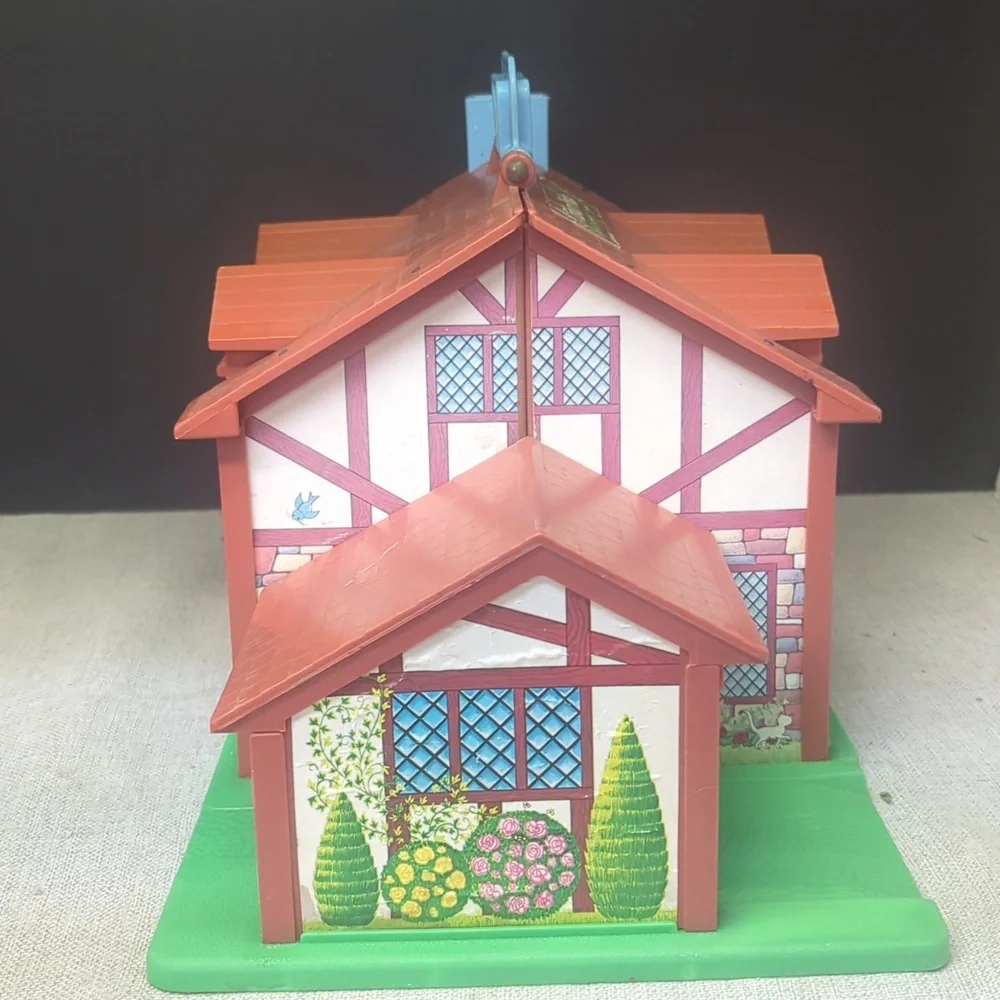 B) Fisher-Price Tudor House #952 brown & white, 2-story house complete w/Nursery